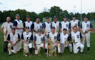 This is a team photo of the 2007 MSBL Men's Baseball team, the Tigers after winning the championship that season. Sean Hearn was the starting catcher for the Championship Tiger's squad.