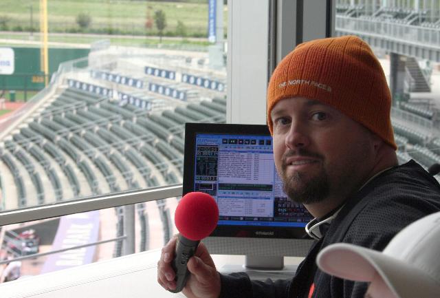 Sean Hearn, owner and DJ for Music in Motion as the public address announcer for the Arkansas Naturals Minor League baseball team.