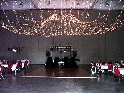 DJ Sean Hearn's sound and lights set up at a wedding reception at the Fort Smith Arkansas Convention Center which includes a 10 foot truss full of Martin, Chauvet and American DJ lights and 2 JBL Eon Power Speakers.