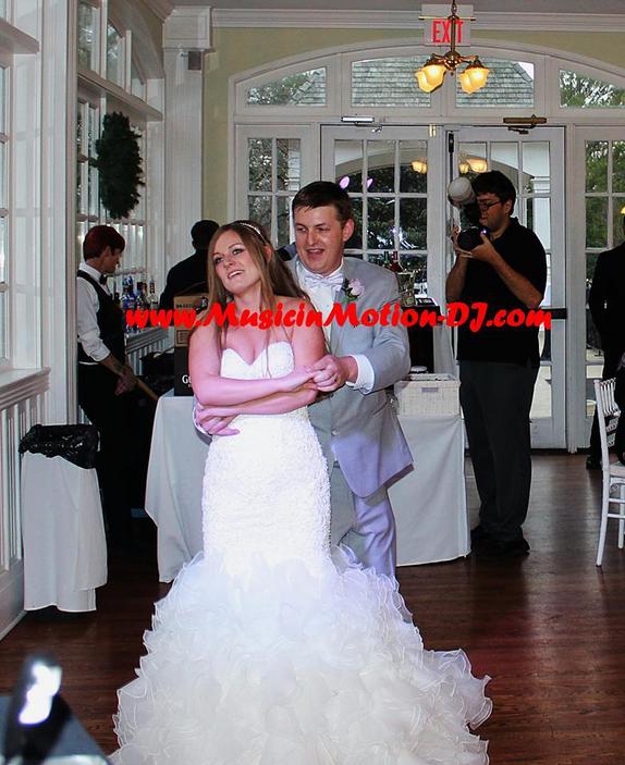 At their wedding reception, during their first dance, Brandon spins his new bride.
