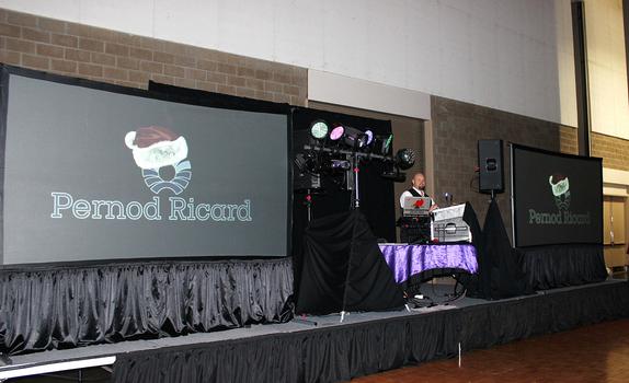 The stage is set up with the DJ Sean Hearn, his grand lights display and 2 huge video screens for the Hirem Walker - Parnod Ricard Christmas Party held in Fort Smith at the Convention Center downtown on Rogers Avenue.