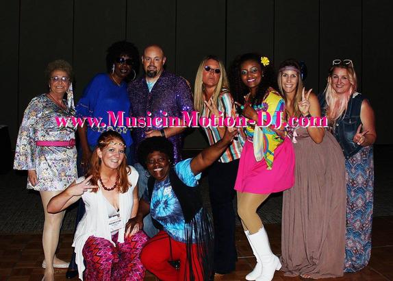 A group photo by guests at the ACAAA spring banquet to show off the 70s Disco outfits.