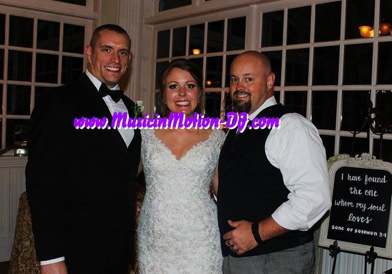 Tyler & Jennifer Blackburn get in a picture with their entertainer at the Crescent Hotel in Eureka Springs AR.
